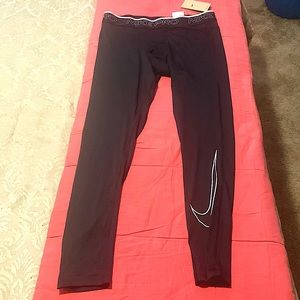 Black Nike Dri-Fit ‘tight fit’ XL compression tights.